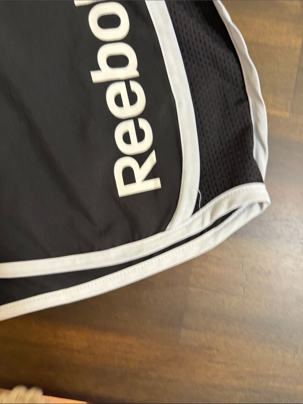 Reebok Black Shorts with White Trim and Side Logo - Picture 3 of 5